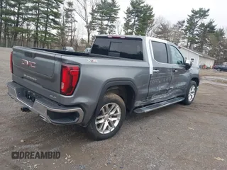 2021 GMC Sierra 1500 SLT z VIN 3GTU9DET8MG413416, wystawiony jako IAAI lot #41935465 z przebiegiem 70 547 mil mil oraz . Historia ofert i sprzedaży dostępna na DreamBid. Obrazek 4.