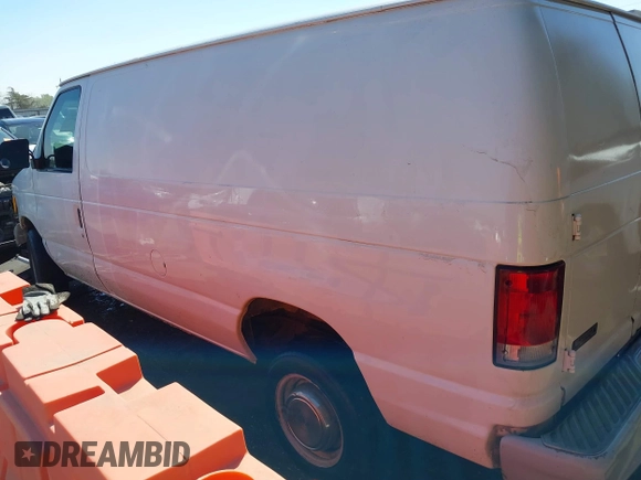2001 Ford Econoline Cargo with VIN 1FTNE24L11HA65062, listed as a IAAI auction lot 41872072 with 456,684 mi miles and . Bid and sale history available at DreamBid. Image 3.
