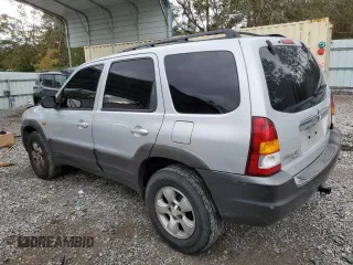 2003 Mazda Tribute LX with VIN 4F2YZ04153KM20941, listed as a Copart auction lot 82683264 with 195,240 mi miles and Salvage Title. Bid and sale history available at DreamBid. Image 2.