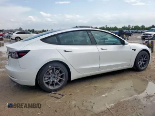 2023 Tesla Model 3 with VIN 5YJ3E1EA1PF550454, listed as a Copart auction lot 58985695 with 19,199 mi miles and Salvage title. Bid and sale history available at DreamBid. Image 3.