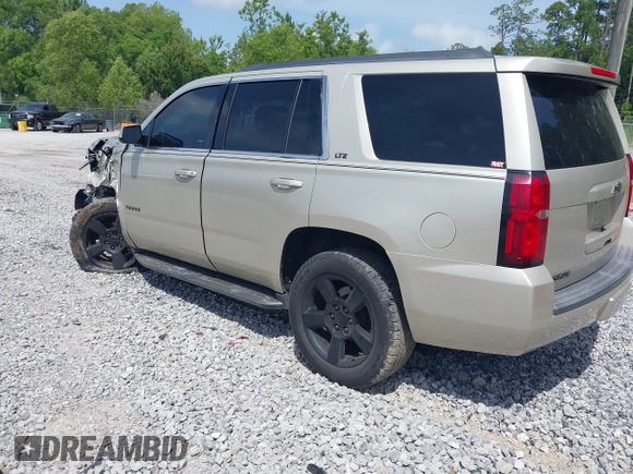 2015 Chevrolet Tahoe LT z VIN 1GNSCBKC7FR140125, wystawiony jako IAAI lot #42279760 z przebiegiem 201 335 mil mil oraz . Historia ofert i sprzedaży dostępna na DreamBid. Obrazek 3.