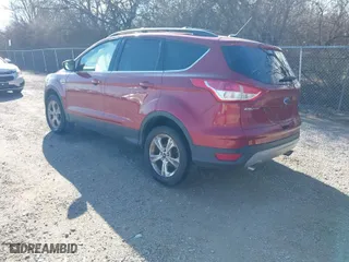 2014 Ford Escape SE with VIN 1FMCU0GX1EUC94976, listed as a IAAI auction lot 41890726 with 119,097 mi miles. Bid and sale history available at carsss.com. Image 3.