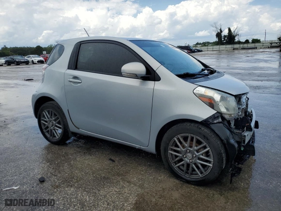 2014 Scion iQ with VIN JTNJJXB02EJ026474, listed as a Copart auction lot 66945404 with NaN miles and Salvage Title. Bid and sale history available at carsss.com. Image 4.