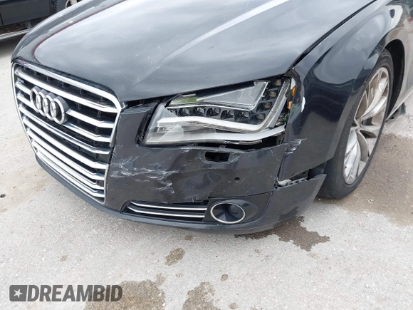2012 Audi A8 L with VIN WAURVAFD5CN038949, listed as a IAAI auction lot 41914575 with 85,634 mi miles. Bid and sale history available at carsss.com. Image 6.