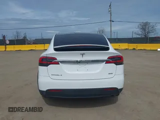 2016 Tesla Model X 70D with VIN 5YJXCBE24GF002020, listed as a IAAI auction lot 41799528 with 149,556 mi miles. Bid and sale history available at carsss.com. Image 16.