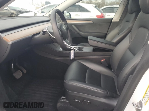 2023 Tesla Model Y Long Range with VIN 7SAYGDEE3PA130988, listed as a Copart auction lot 42172185 with 112,136 mi miles and Salvage Title. Bid and sale history available at DreamBid. Image 7.