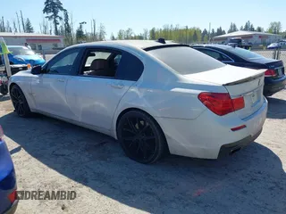 2012 BMW 7 Series 750Li with VIN WBAKB8C52CDX20757, listed as a IAAI auction lot 42057654 with 137,947 mi miles. Bid and sale history available at carsss.com. Image 3.