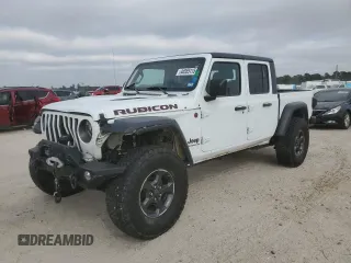 2021 Jeep Gladiator Rubicon с VIN 1C6JJTBG4ML598327, выставлен на аукционе Copart как лот 44555115 с пробегом 76 504 миль миль и Списание • Salvage title. История ставок и продаж доступна на DreamBid. Изображение 1.