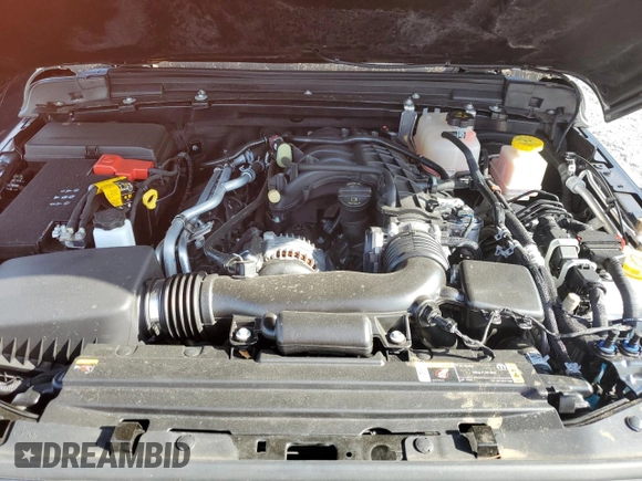 2023 Jeep Gladiator Rubicon с VIN 1C6JJTBGXPL574702, выставлен на аукционе Copart как лот 75914474 с пробегом 10 506 миль миль и Списание • Salvage title. История ставок и продаж доступна на DreamBid. Изображение 11.