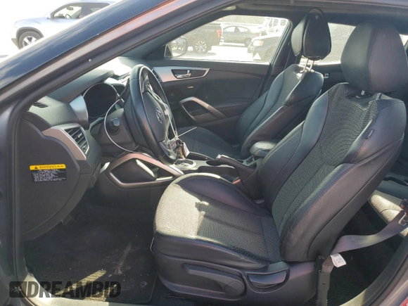 2016 Hyundai Veloster z VIN KMHTC6AD3GU293108, wystawiony jako Copart lot #47107635 z przebiegiem 97 731 mil mil oraz Szkoda całkowita • Salvage title. Historia ofert i sprzedaży dostępna na DreamBid. Obrazek 7.