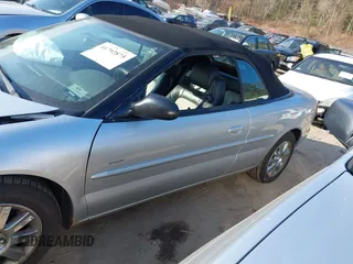 2004 Chrysler Sebring LXi with VIN 1C3EL55R54N239266, listed as a IAAI auction lot 41792875 with 76,712 mi miles and . Bid and sale history available at DreamBid. Image 14.