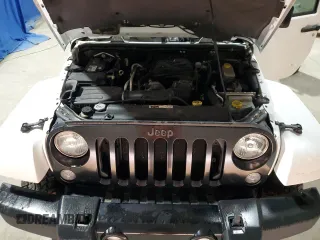 2014 Jeep Wrangler Unlimited Sahara с VIN 1C4BJWEG1EL322781, выставлен на аукционе Copart как лот 64200145 с пробегом 119 500 миль миль и Чистый • Clean title. История ставок и продаж доступна на DreamBid. Изображение 12.