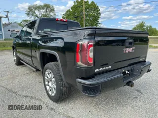 2018 GMC Sierra 1500 Denali z VIN 3GTU2PEJXJG171695, wystawiony jako Copart lot #59631005 z przebiegiem 226 029 mil mil oraz Czysty tytuł • Clean title. Historia ofert i sprzedaży dostępna na DreamBid. Obrazek 3.