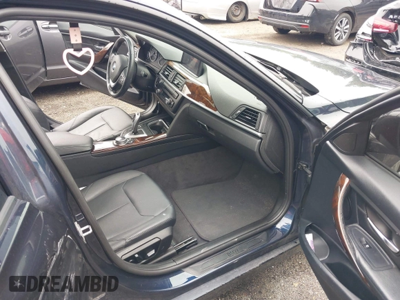 2015 BMW 3 Series 328i xDrive with VIN WBA3B3G5XFNR86284, listed as a IAAI auction lot 42480891 with 65,449 mi miles and . Bid and sale history available at DreamBid. Image 5.