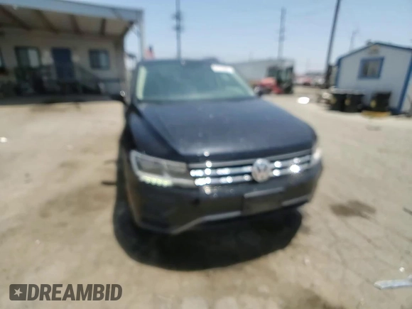 2018 Volkswagen Tiguan SEL with VIN 3VV3B7AX0JM051848, listed as a Copart auction lot 60320655 with 75,141 mi miles and Salvage title. Bid and sale history available at DreamBid. Image 14.