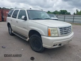 2004 Cadillac Escalade z VIN 1GYEK63N74R290761, wystawiony jako IAAI lot #42135874 z przebiegiem 247 246 mil mil oraz . Historia ofert i sprzedaży dostępna na DreamBid. Obrazek 1.