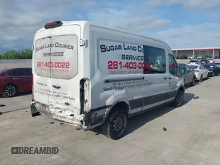2018 Ford Transit z VIN 1FTYR2CM3JKA19554, wystawiony jako IAAI lot #42058523 z przebiegiem 372 734 mil mil oraz . Historia ofert i sprzedaży dostępna na DreamBid. Obrazek 4.