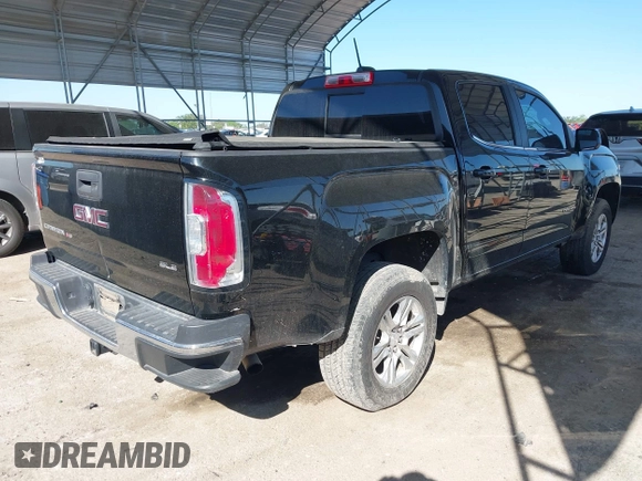 2019 GMC Canyon 2WD SLE with VIN 1GTG5CEN2K1238175, listed as a IAAI auction lot 41964502 with 96,107 mi miles and . Bid and sale history available at DreamBid. Image 4.