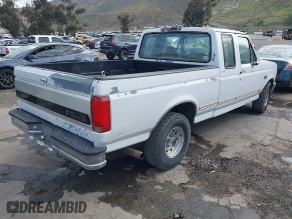 1996 Ford F-150 with VIN 1FTEX15H9TKA56551, listed as a IAAI auction lot 41674788 with 314,443 mi miles. Bid and sale history available at carsss.com. Image 4.