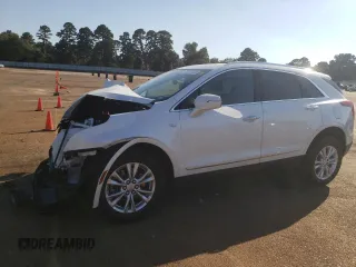 2024 Cadillac XT5 FWD Luxury with VIN 1GYKNAR49RZ729560, listed as a Copart auction lot 74615324 with 6,007 mi miles and Salvage title. Bid and sale history available at DreamBid. Image 1.