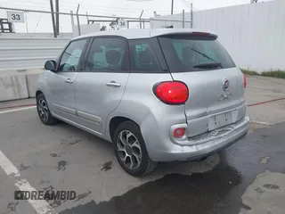 2014 FIAT 500L Lounge z VIN ZFBCFACH8EZ005035, wystawiony jako IAAI lot #41824368 z przebiegiem 80 914 mil mil oraz . Historia ofert i sprzedaży dostępna na DreamBid. Obrazek 3.