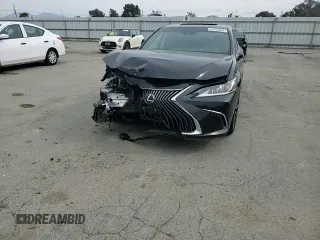 2021 Lexus ES 300h z VIN 58ADA1C12MU006944, wystawiony jako Copart lot #54704865 z przebiegiem 77 186 mil mil oraz Szkoda całkowita • Salvage title. Historia ofert i sprzedaży dostępna na DreamBid. Obrazek 13.