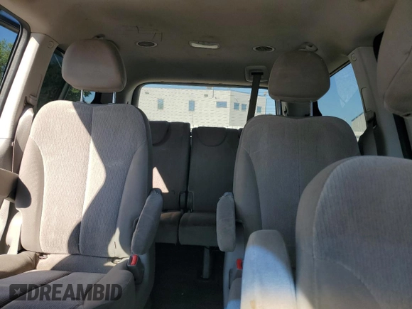 2012 Kia Sedona LX with VIN KNDMG4C70C6447748, listed as a Copart auction lot 71377294 with 146,057 mi miles and Salvage Title. Bid and sale history available at carsss.com. Image 10.