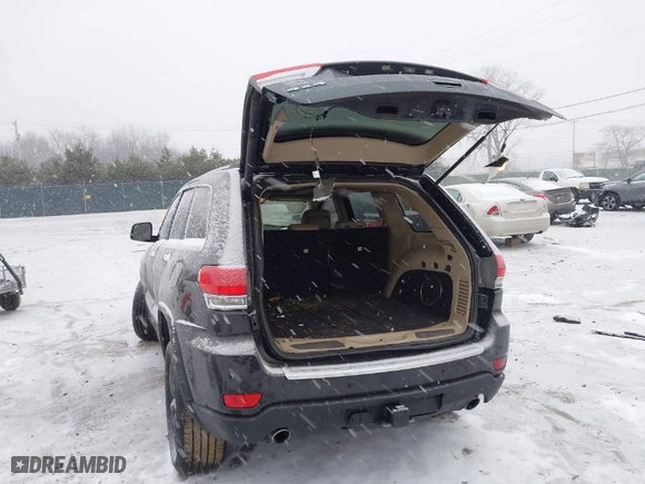 2013 Jeep Grand Cherokee Limited with VIN 1C4RJFBT4DC567444, listed as a IAAI auction lot 41300410 with 121,665 mi miles. Bid and sale history available at carsss.com. Image 3.