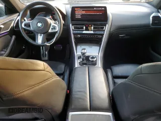 2023 BMW 8 Series 840i with VIN WBAGV2C01PCK95705, listed as a Copart auction lot 83424634 with 23,674 mi miles and Salvage Title. Bid and sale history available at carsss.com. Image 8.