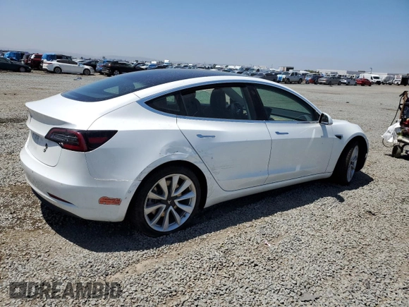 2019 Tesla Model 3 Mid Range z VIN 5YJ3E1EA3KF402556, wystawiony jako Copart lot #56212875 z przebiegiem 89 022 mil mil oraz Szkoda całkowita • Salvage title. Historia ofert i sprzedaży dostępna na DreamBid. Obrazek 3.