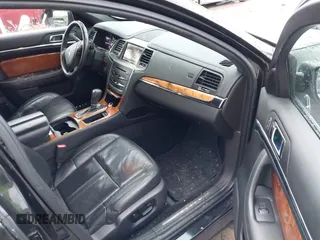 2014 Lincoln MKS with VIN 1LNHL9EK3EG601471, listed as a IAAI auction lot 41142126 with 110,432 mi miles. Bid and sale history available at carsss.com. Image 5.