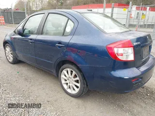 2011 Suzuki SX4 LE with VIN JS2YC5A23B6304713, listed as a IAAI auction lot 41997287 with 114,024 mi miles. Bid and sale history available at carsss.com. Image 3.