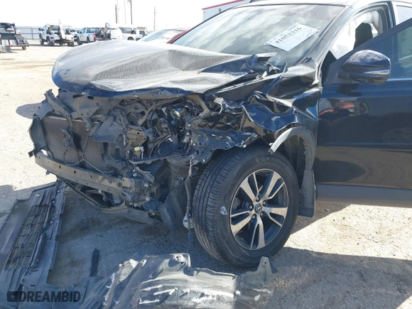 2017 Toyota RAV4 XLE with VIN 2T3RFREV9HW567801, listed as a IAAI auction lot 41053316 with 103,267 mi miles. Bid and sale history available at carsss.com. Image 6.