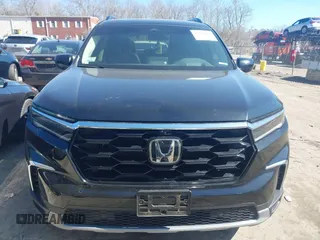 2023 Honda Pilot Elite with VIN 5FNYG1H84PB008077, listed as a IAAI auction lot 41762661 with 41,412 mi miles. Bid and sale history available at carsss.com. Image 12.