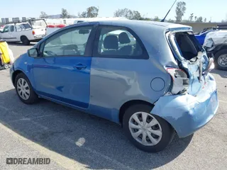 2010 Toyota Yaris with VIN JTDJT4K31A5314450, listed as a IAAI auction lot 41827488 with 212,976 mi miles. Bid and sale history available at carsss.com. Image 3.