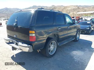 2006 Chevrolet Tahoe LS with VIN 1GNEC13V06R122296, listed as a IAAI auction lot 42712974 with 208,701 mi miles and . Bid and sale history available at DreamBid. Image 4.