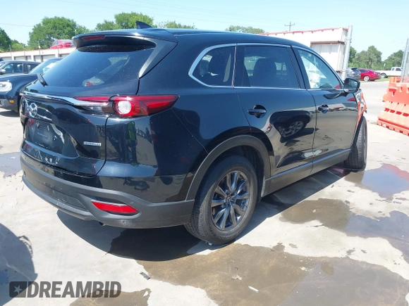 2023 Mazda CX-9 Touring with VIN JM3TCBCY2P0651679, listed as a IAAI auction lot 42002920 with 67,791 mi miles and . Bid and sale history available at DreamBid. Image 4.