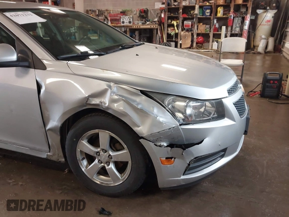 2013 Chevrolet Cruze 1LT with VIN 1G1PC5SB6D7314923, listed as a IAAI auction lot 42071232 with 105,918 mi miles and . Bid and sale history available at DreamBid. Image 6.