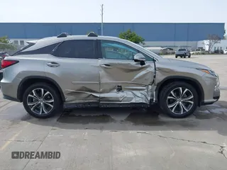 2019 Lexus RX with VIN 2T2BGMCA9KC033583, listed as a IAAI auction lot 41507244 with 67,484 mi miles. Bid and sale history available at carsss.com. Image 13.