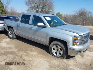 2015 Chevrolet Silverado 1500 LT with VIN 3GCUKREC0FG316716, listed as a IAAI auction lot 41908921 with 242,093 mi miles and . Bid and sale history available at DreamBid. Image 1.