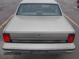 1987 Oldsmobile Cutlass Ciera z VIN 2G3AJ51W9H9378093, wystawiony jako IAAI lot #42080335 z przebiegiem 54 504 mil mil oraz . Historia ofert i sprzedaży dostępna na DreamBid. Obrazek 16.