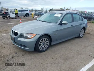 2007 BMW 3 Series 328i with VIN WBAVC53527FZ72561, listed as a IAAI auction lot 41891455 with 146,096 mi miles and . Bid and sale history available at carsss.com. Image 2.