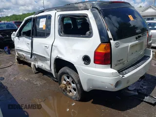 2003 GMC Envoy SLT z VIN 1GKES16S136235222, wystawiony jako IAAI lot #42245115 z przebiegiem Nie podano mil oraz . Historia ofert i sprzedaży dostępna na DreamBid. Obrazek 3.