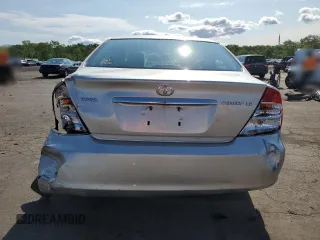 2004 Toyota Camry LE z VIN JTDBE32K640270298, wystawiony jako Copart lot #58800955 z przebiegiem 79 064 mil mil oraz Szkoda całkowita • Salvage title. Historia ofert i sprzedaży dostępna na DreamBid. Obrazek 6.
