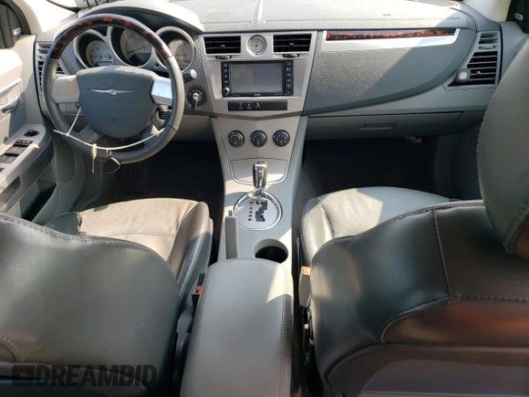 2008 Chrysler Sebring Limited with VIN 1C3LC66M08N277459, listed as a Copart auction lot 60237525 with 122,590 mi miles and Salvage title. Bid and sale history available at DreamBid. Image 8.