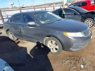 2009 Kia Optima LX with VIN KNAGE228395361458, listed as a IAAI auction lot 41418800 with 182,220 mi miles. Bid and sale history available at carsss.com. Image 1.