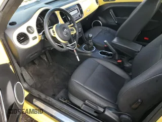 2015 Volkswagen Beetle with VIN 3VWH17AT4FM636845, listed as a Copart auction lot 81332594 with 87,369 mi miles and Salvage Title. Bid and sale history available at DreamBid. Image 7.