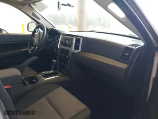 2008 Jeep Grand Cherokee Laredo with VIN 1J8GR48K18C222454, listed as a IAAI auction lot 42047541 with 180,145 mi miles. Bid and sale history available at carsss.com. Image 5.