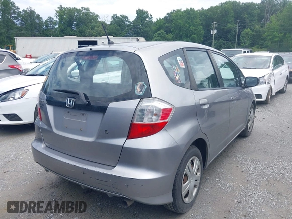 2010 Honda Fit z VIN JHMGE8H2XAS020698, wystawiony jako IAAI lot #42549063 z przebiegiem 260 454 mil mil oraz . Historia ofert i sprzedaży dostępna na DreamBid. Obrazek 4.