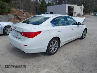 2015 Infiniti Q50 Premium z VIN JN1BV7ARXFM399617, wystawiony jako IAAI lot #41884672 z przebiegiem 116 320 mil mil oraz . Historia ofert i sprzedaży dostępna na DreamBid. Obrazek 4.